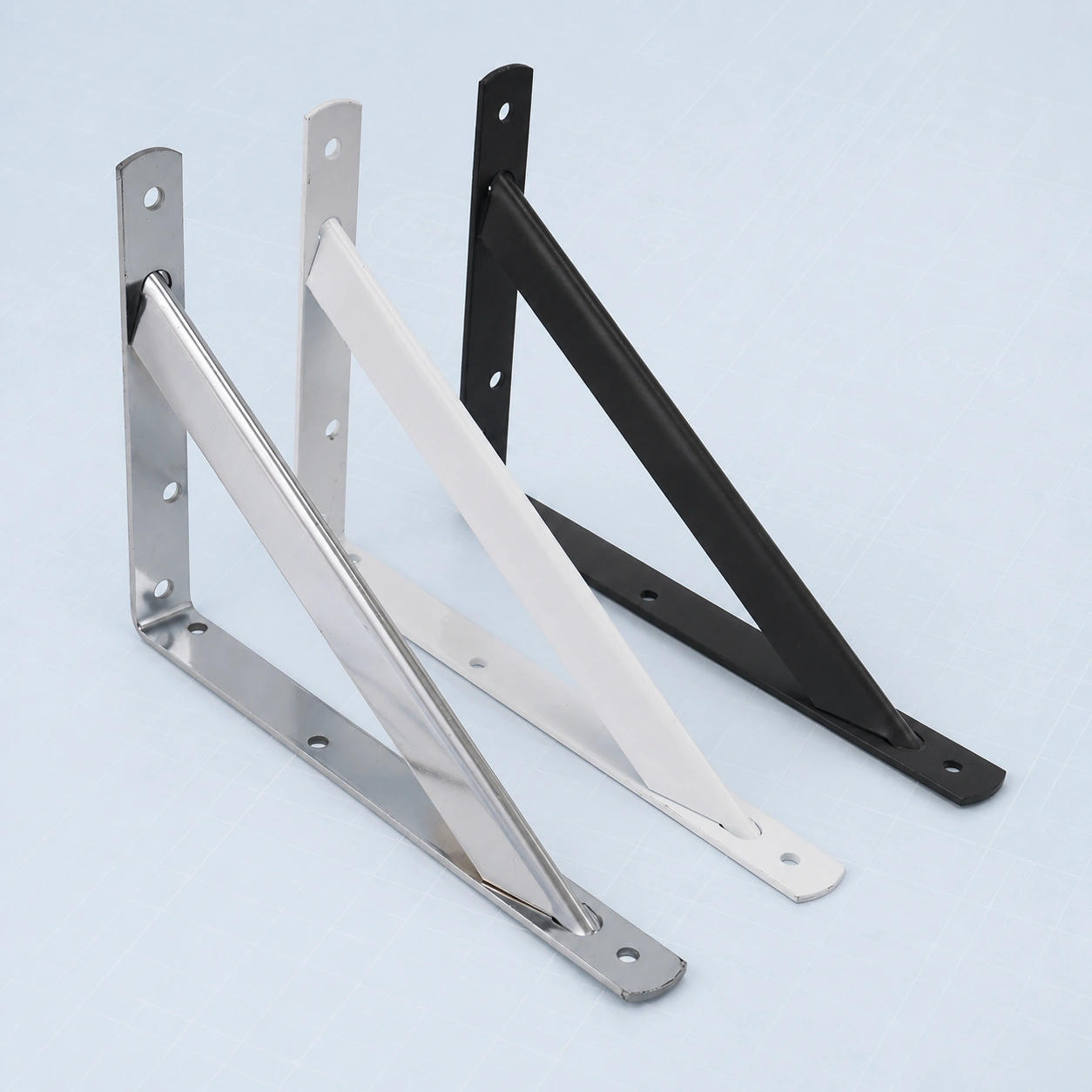 Flat-bar metal shelf bracket range on a pale ice-blue studio background