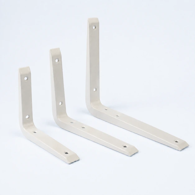 Three off-white metal shelf brackets in graduated sizes on a pale ice-blue studio background