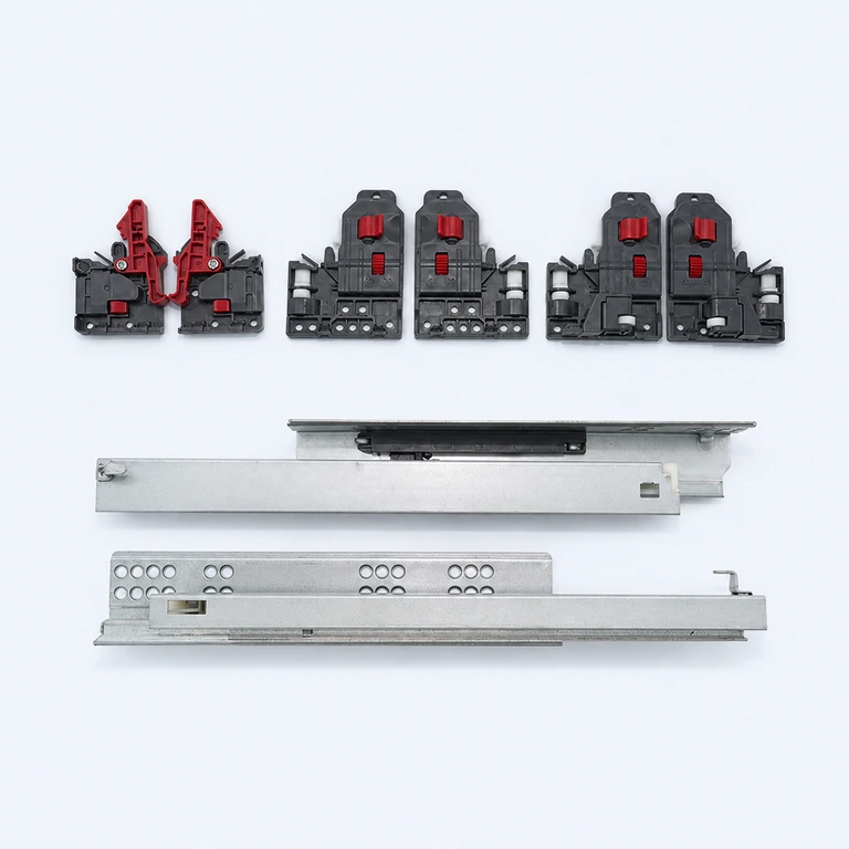 Metal undermount drawer slides with black and red locking devices on a pale ice-blue background