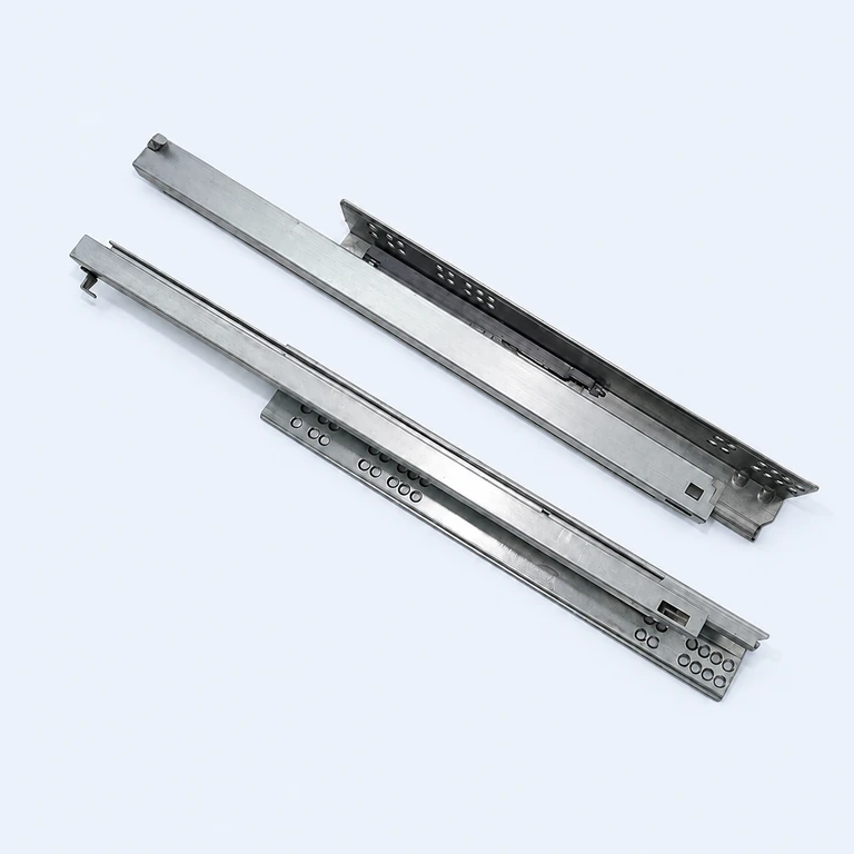 Metal undermount drawer slide rail assemblies on a pale ice-blue background