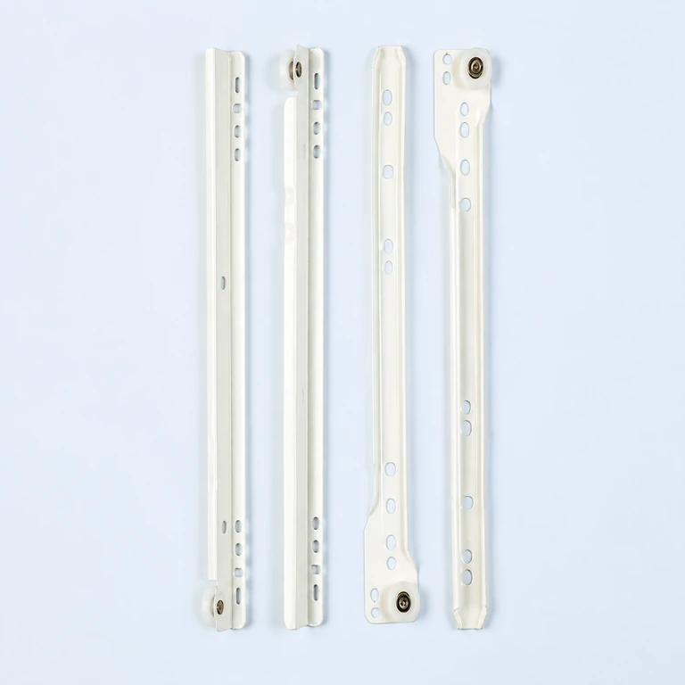 Light-colored roller drawer slide rails on a pale ice-blue background