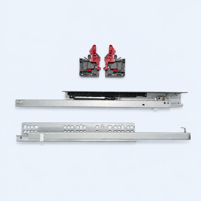 Metal undermount drawer slides with black and red locking devices on a pale ice-blue background
